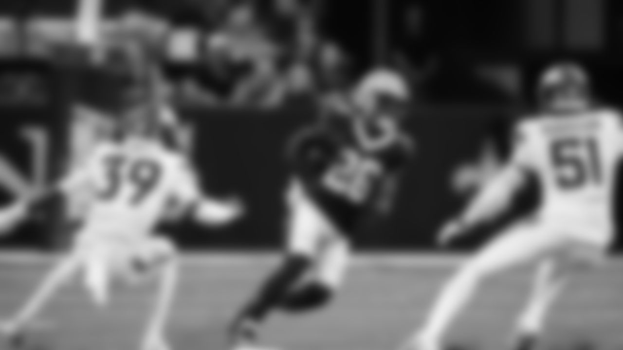 New Orleans Saints running back Cam Akers (26) Denver Broncos cornerback Joshua Pickett (39) and linebacker Que Robinson (51) during a preseason NFL football game in New Orleans, Saturday, Aug. 23, 2025. (AP Photo/Gerald Herbert)