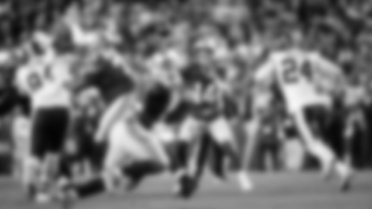 Seahawks quarterback Sam Darnold fires a pass to running back Kenneth Walker III on the opening drive. Darnold was a perfect 16 for 16 passing in the first half.