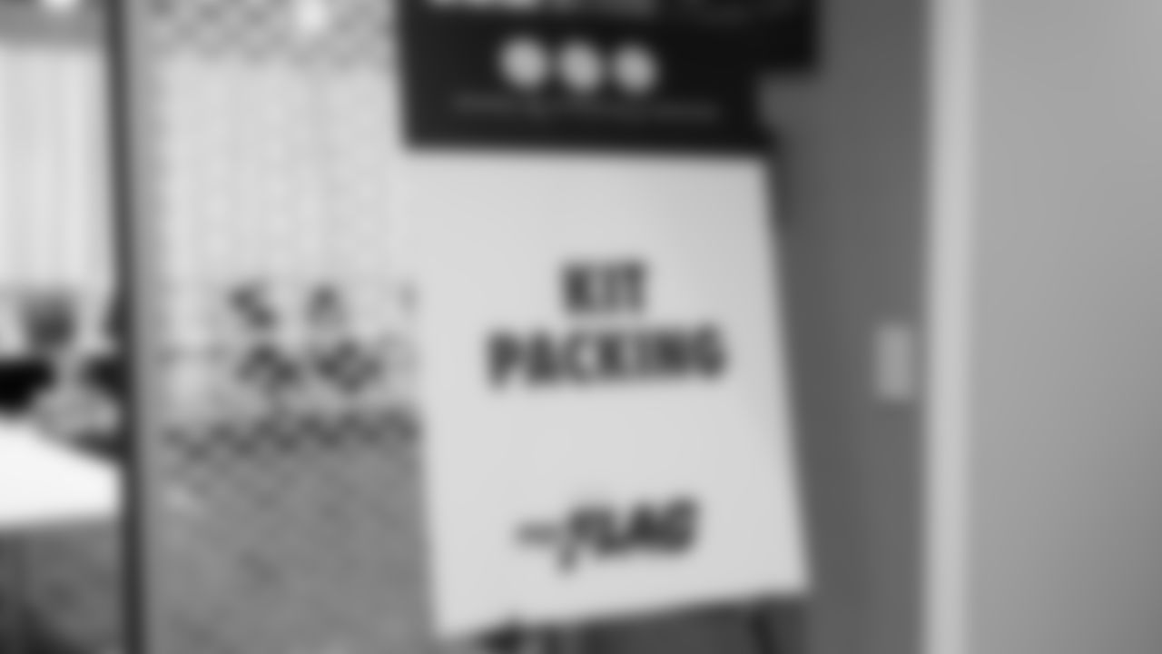 The Seahawks Women's Association packed girls flag kits and hosted a free girls flag football camp at the Seahawks training facility on Saturday, November 8, 2025.