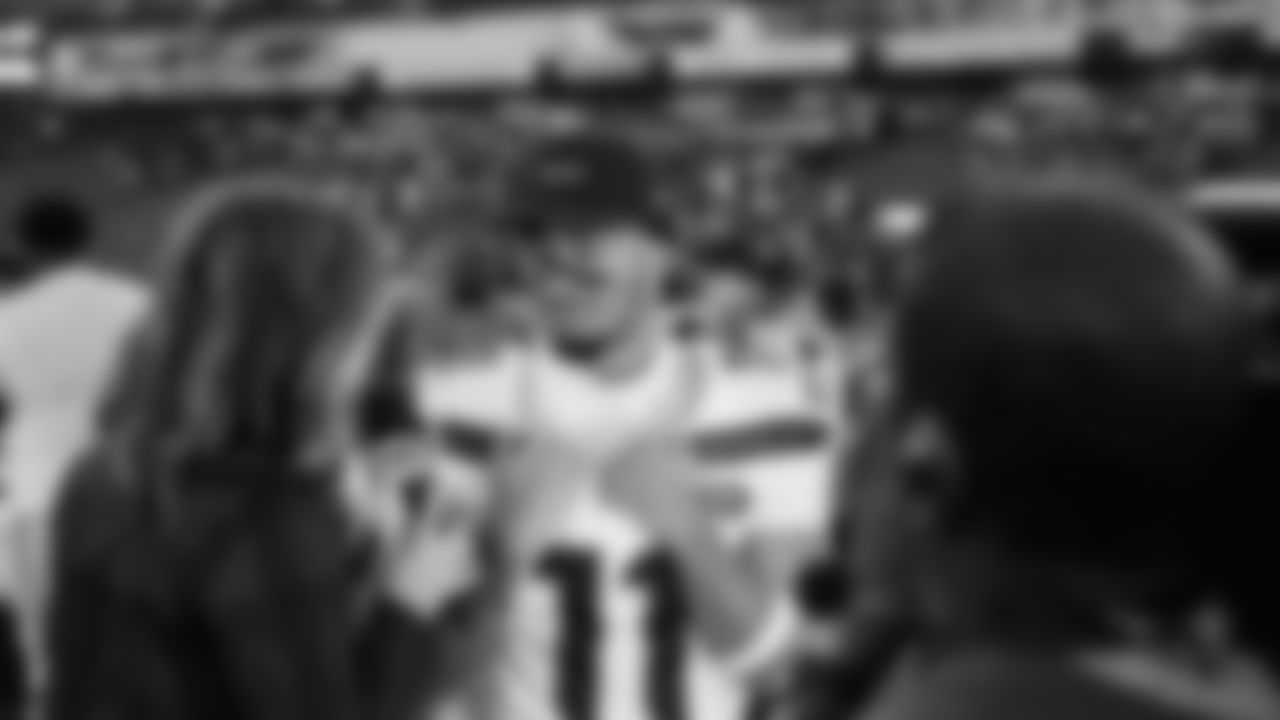 Seahawks celebrate the 30-24 win over the Tennessee Titans at Nissan Stadium on November 23, 2025.