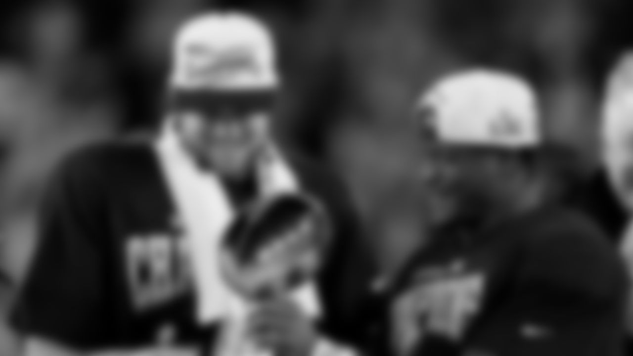 Seattle Seahawks quarterback Sam Darnold, and running back Kenneth Walker III celebrate with the Lombardi Trophy after defeating the New England Patriots after the NFL Super Bowl 60 football game, Sunday, Feb. 8, 2026, in Santa Clara, Calif. (AP Photo/Morry Gash)