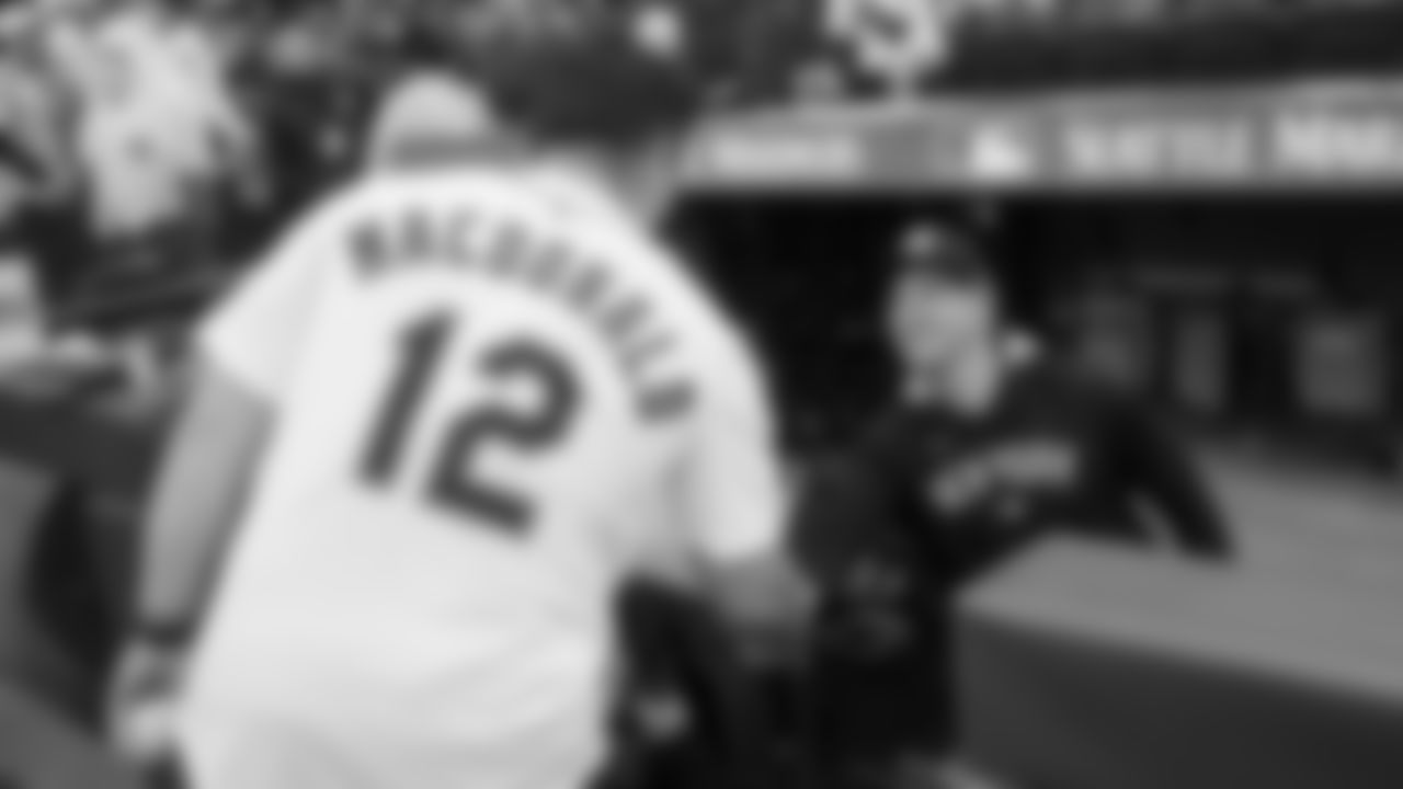 Seahawks head coach Mike Macdonald was joined by comedian Adam Ray as they tossed out the first pitch for the Mariners vs. Yankees game on May 12, 2025 at T-Mobile Park.