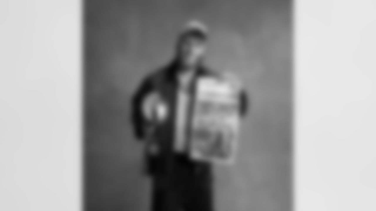 Seahawks wide receiver Cooper Kupp (10) with the Lombardi Trophy after winning Super Bowl LX.