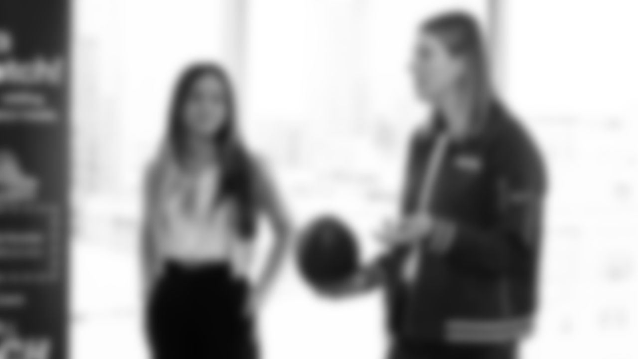 Seahawks wide receiver Jake Bobo presented the official game ball to Virginia Mason Franciscan Health on October 28, 2025.