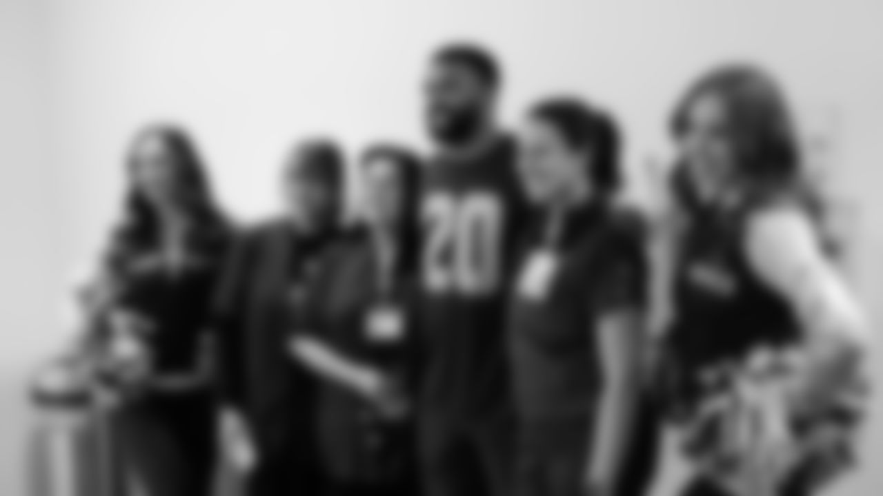 Seahawks Safety Julian Love and the Seahawks Dancers brought holiday spirit to Virginia Mason Medical Center's Critical Care Unit, visiting heart surgery patients and sharing encouragement during recovery.