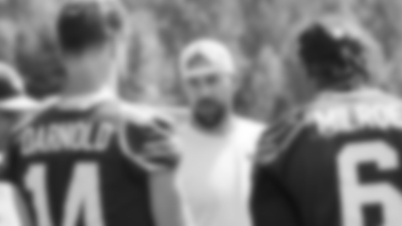 Seahawks quarterback Sam Darnold (14) and quarterback Jalen Milroe (6) with offensive coordinator Klint Kubiak on day two of minicamp on Wednesday, June 11, 2025 at the Virginia Mason Athletic Center.