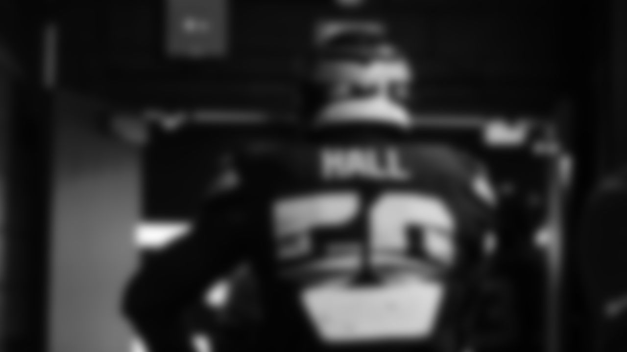 Seahawks linebacker Derick Hall (58) walks through the Emerald Queen Casino tunnel club at Lumen Field for the Week 10 matchup vs. the Cardinals.