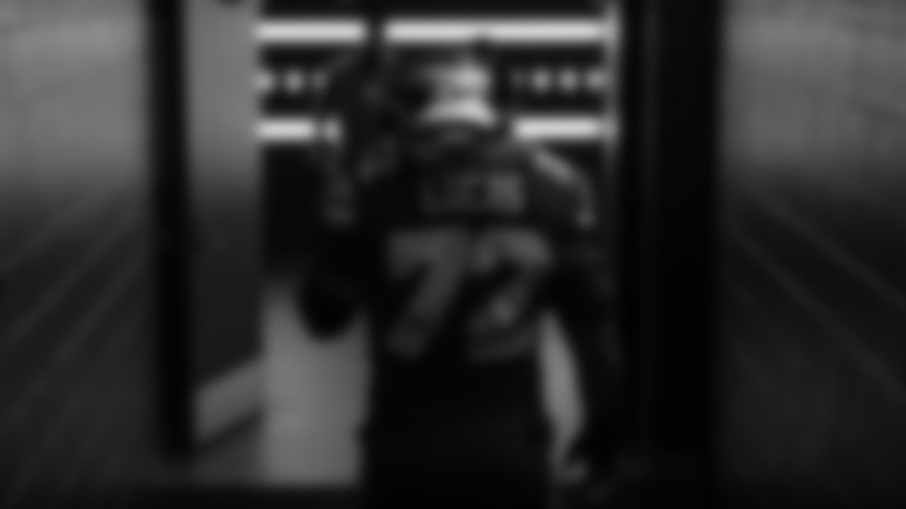 Seahawks tackle Abraham Lucas (72) walks through the Emerald Queen Casino tunnel club at Lumen Field for the Week 10 matchup vs. the Cardinals.