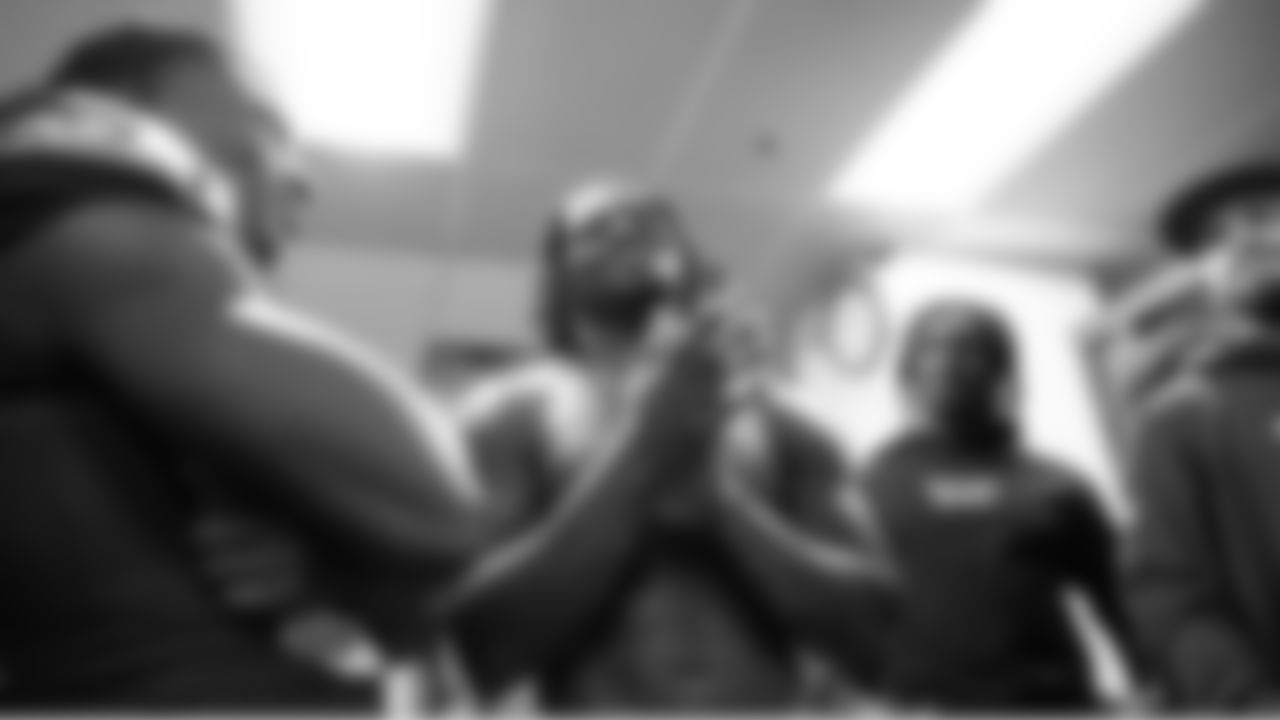 Seahawks linebacker Tyrice Knight speaks to the team after his performance was singled out by head coach Mike Macdonald after the game.