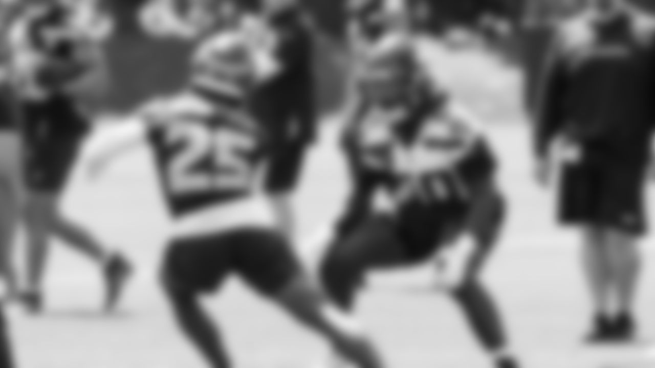 Seahawks linebacker Jamie Sheriff (50) and running back Kenny McIntosh (25) participated in a workout on day four of OTAs on Monday, June 2, 2025 at the Virginia Mason Athletic Center.