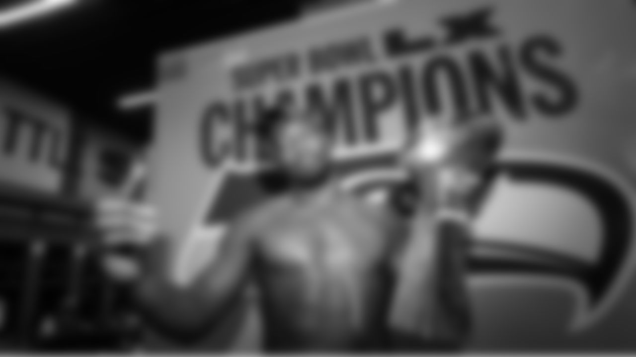 Linebacker DeMarcus Lawrence, who came to Seattle in the offseason looking for an opportunity to win a Super Bowl, saw his wish come true and posed with Lombardi Trophy in the victorious locker room.