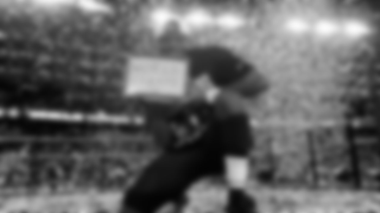 Seattle Seahawks running back Kenneth Walker III (9) holds a Microsoft Surface tablet after defeating the New England Patriots in the NFL Super Bowl 60 football game, Sunday, Feb. 8, 2026, in Santa Clara, Calif. (AP Photo/Doug Benc)