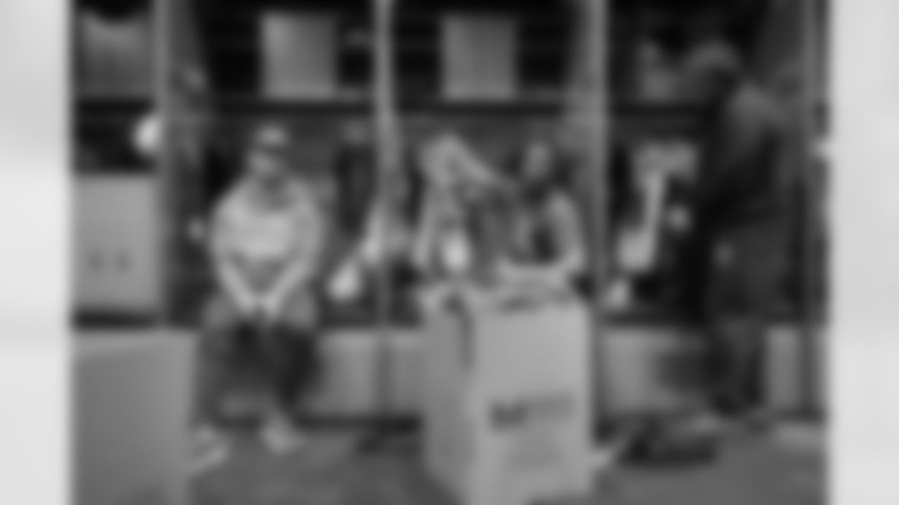 Seahawks running back George Holani (36) and running back Kenny McIntosh (25) in the locker room following the end of the 2024 season on Monday, January 6, 2025.