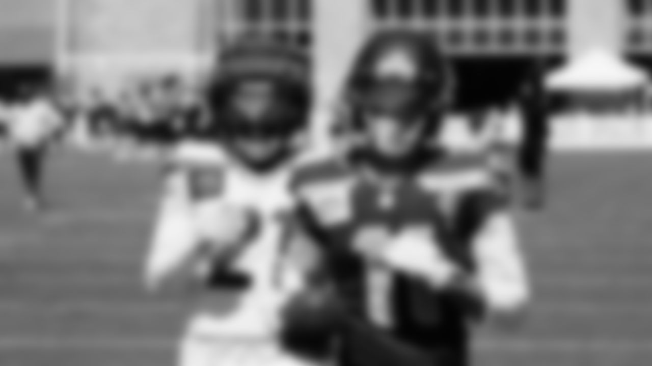 Seahawks cornerback Devon Witherspoon (21) and wide receiver Jaxon Smith-Njigba (11) practiced on August 12, 2025 at the Virginia Mason Athletic Center.