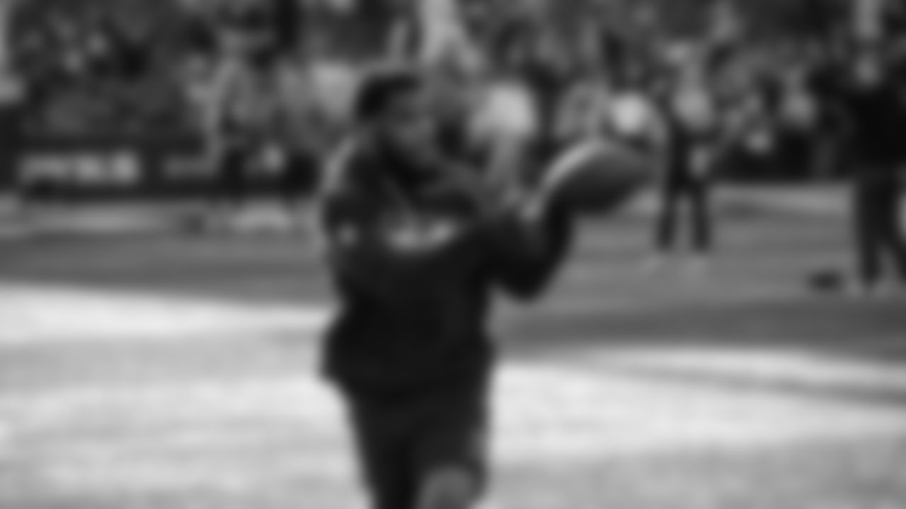 Seahawks cornerback Devon Witherspoon (21) warms up at Lumen Field for the Week 10 matchup vs. the Arizona Cardinals.