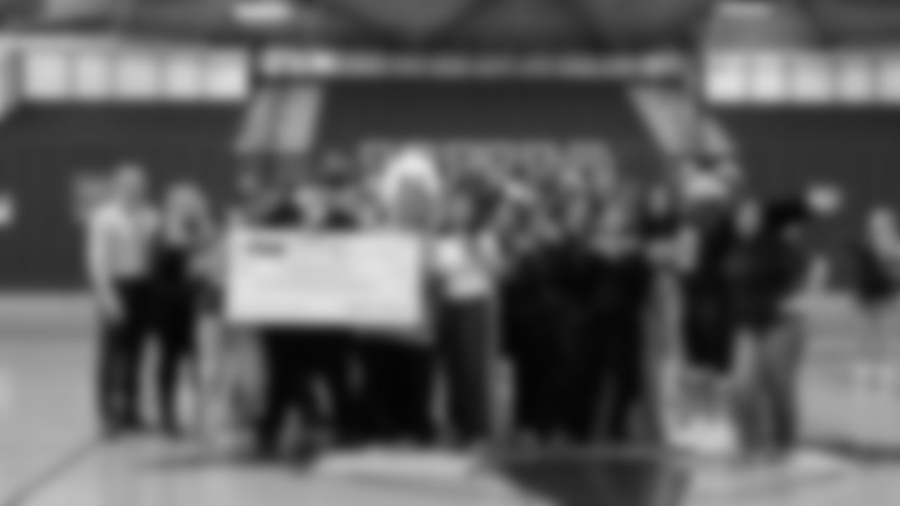 The Seahawks, Safeway, Delta Air Lines, Coca-Cola, and Head & Shoulders surprised Washington High School with a grant to support their girls flag football program on Tuesday, November 25, 2025.