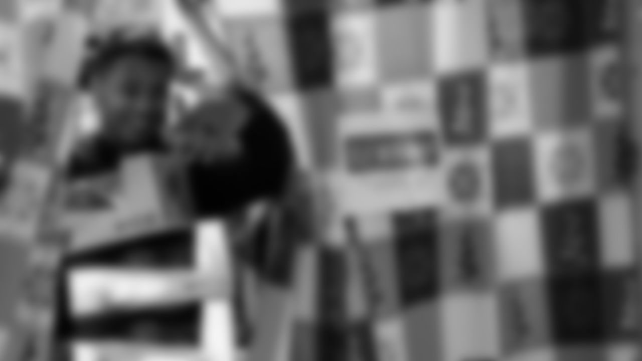 Seahawks Fullback Brady Russell, the Seahawks Dancers, and Blitz spent the day volunteering at Santa's Castle on Joint Base Lewis-McChord to celebrate the holidays and support service members and their families.