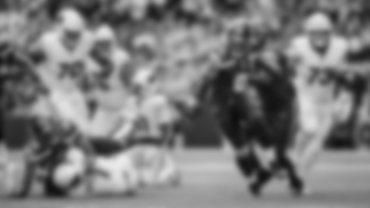 After teammate Tyrice Knight knocked the ball loose, DeMarcus Lawrence races to secure his second fumble recovery for a touchdown in the first half.