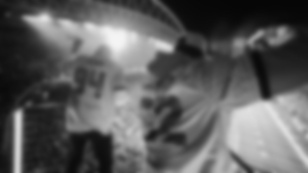 Seahawks Legends Chad Brown and Darrell Jackson raise the flag before the Week 16 Rivalries matchup against the Rams on December 18th, 2025