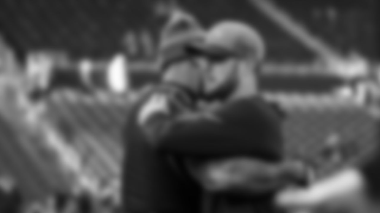 Seahawks quarterback Sam Darnold (14) and tight end Elijah Arroyo (18) warm up at Lumen Field for the Week 10 matchup vs. the Arizona Cardinals.