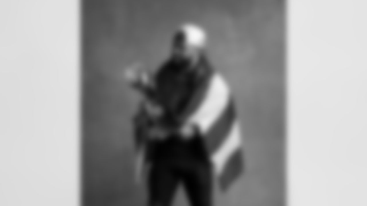 Seahawks safety Julian Love (20) with the Lombardi Trophy after winning Super Bowl LX.