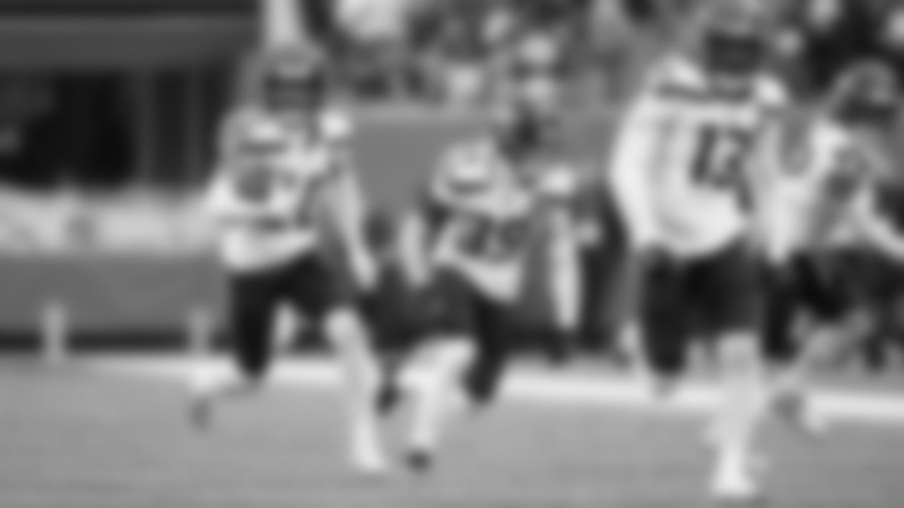 Seahawks safety Julian Love returns his interception in the third quarter.