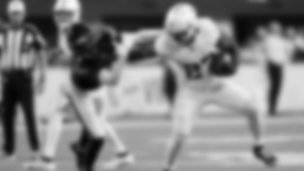 Minnesota Vikings running back Cam Akers (27) carries the ball against Chicago Bears cornerback Jaylon Johnson (1) during an NFL football game, Monday, Dec. 16, 2024 in Minneapolis. (Todd Rosenberg via AP)