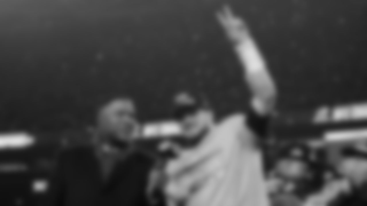 Seattle Seahawks quarterback Sam Darnold, celebrates next to Michael Strahan, left, after a win over the Los Angeles Rams in the NFC Championship NFL football game Sunday, Jan. 25, 2026, in Seattle. (AP Photo/Lindsey Wasson)