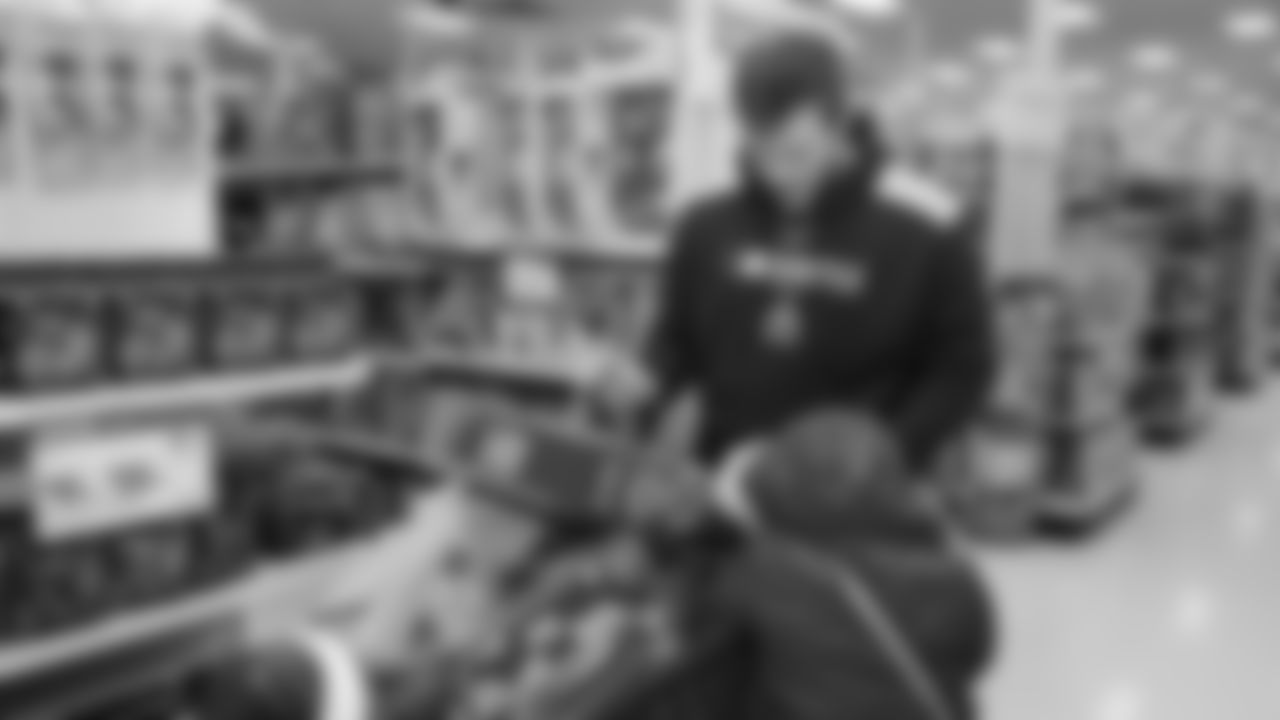 Seahawks offensive lineman Josh Jones was joined by fellow offensive linemen as they hosted a holiday shopping spree for kids from the Boys & Girls Club on December 9, 2025.