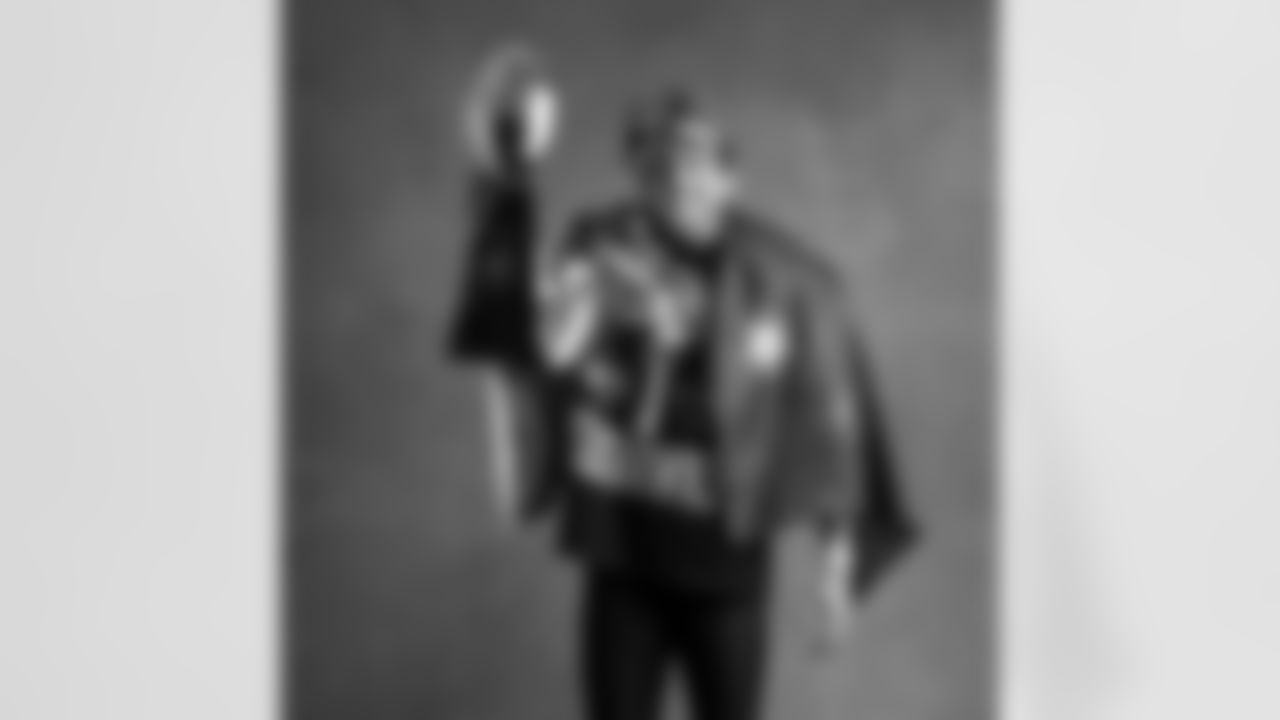 Seahawks punter Michael Dickson (4) with the Lombardi Trophy after winning Super Bowl LX.