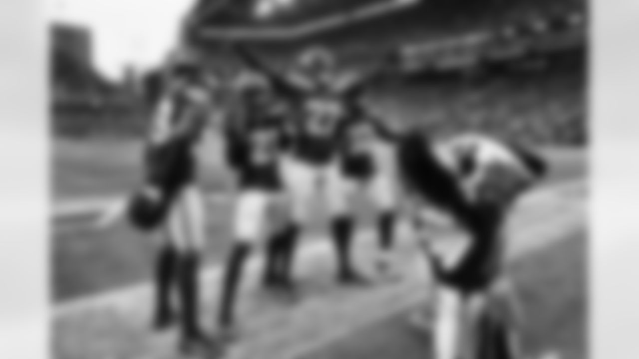 Members of the Seahawks defensive backfield pose after Devon Witherspoon forced a fumble which was recovered by Riq Woolen. Joining them are Artie Burns and Jerrick Reed.
