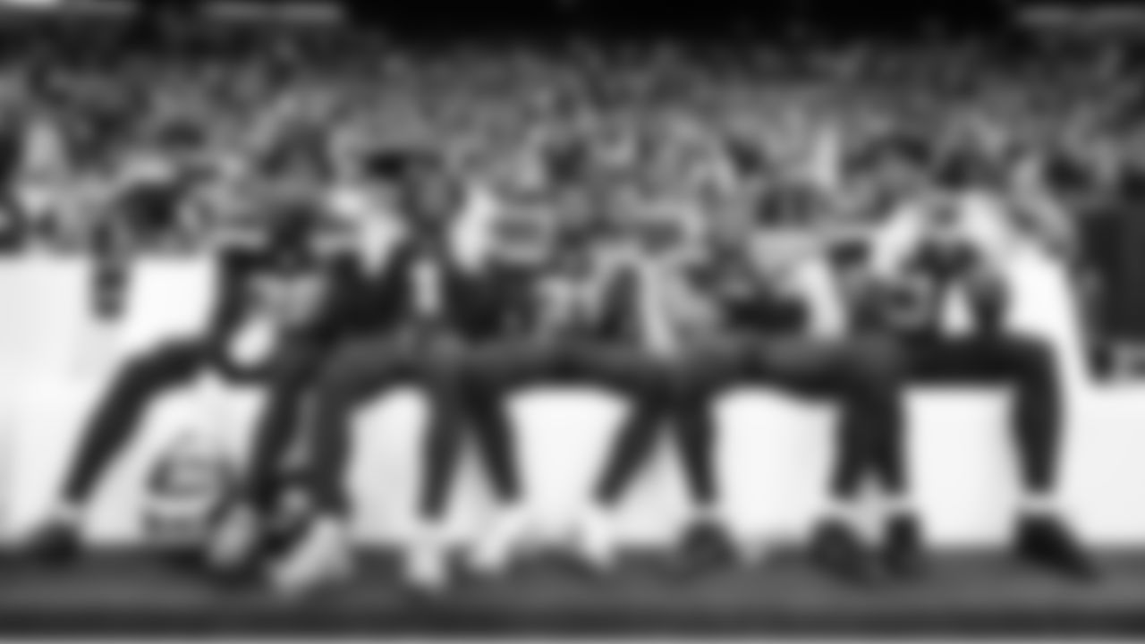 As the clock winds down, defensive backs Nehemiah Pritchett, Derion Kendrick, Devon Witherspoon, Coby Bryant and Nick Emmanwori celebrate a job well done.