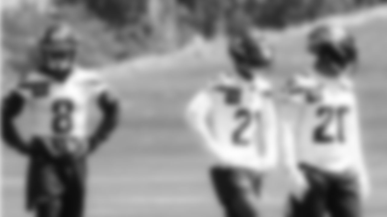 Seahawks safety Coby Bryant (8), cornerback Devon Witherspoon (21) and safety Julian Love (20) participated in a workout on day four of OTAs on Monday, June 2, 2025 at the Virginia Mason Athletic Center.