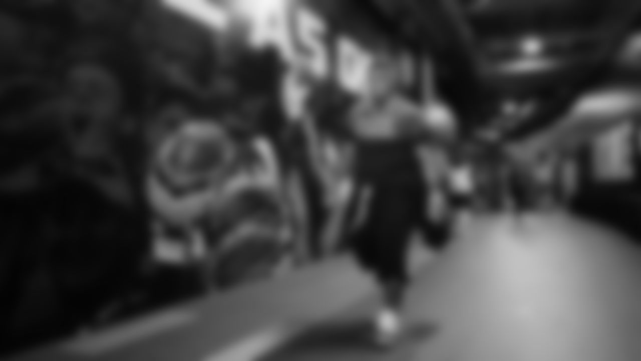 On gameday, defensive tackle Byron Murphy II walks to the locker room upon arriving at the stadium.