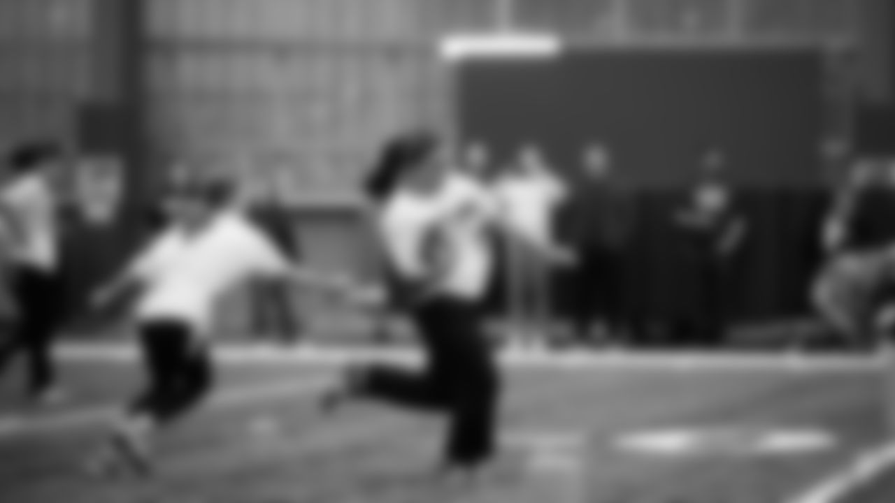 The Seahawks Women's Association packed girls flag kits and hosted a free girls flag football camp at the Seahawks training facility on Saturday, November 8, 2025.