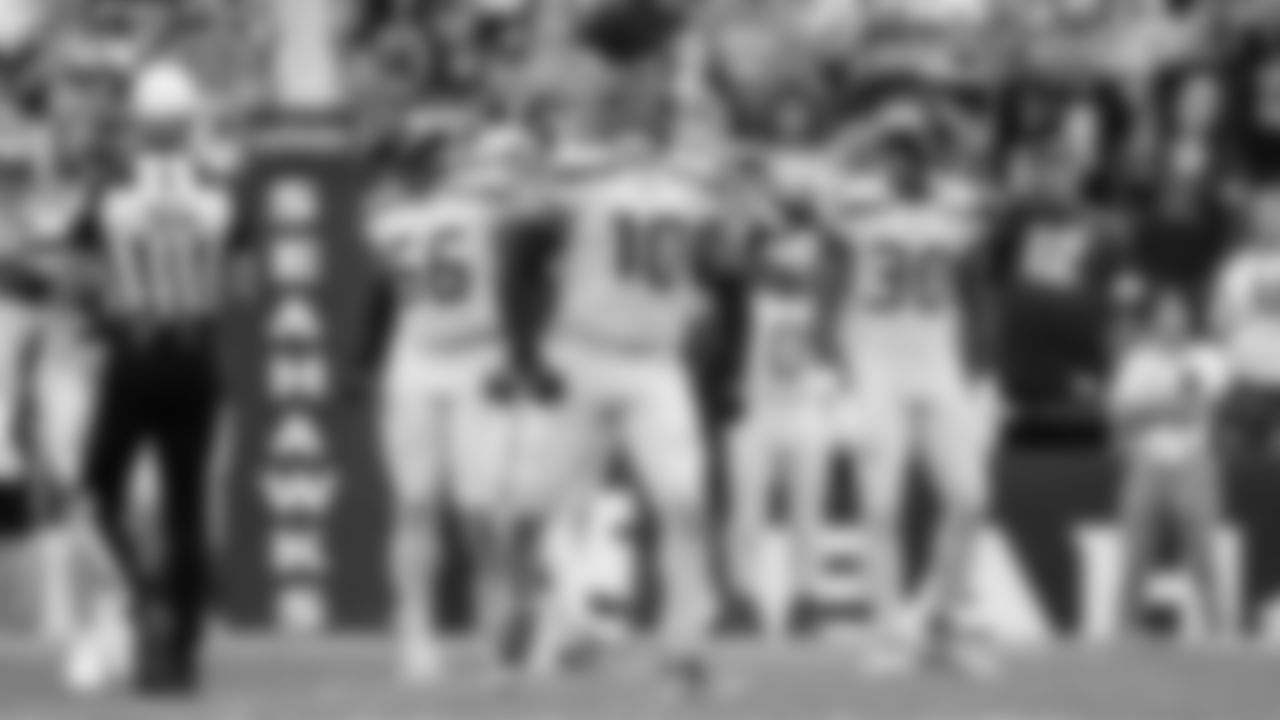 Seattle's Uchenna Nwosu celebrates after a red zone stop.