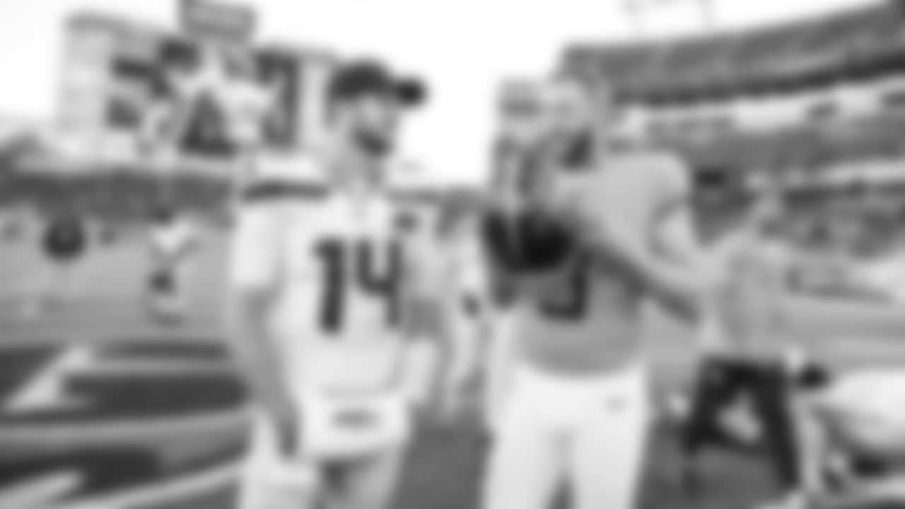 Seahawks celebrate the 30-24 win over the Tennessee Titans at Nissan Stadium on November 23, 2025.