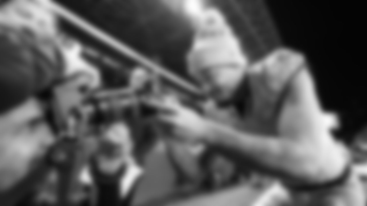 On his way back to the locker room, receiver Jaxon Smith-Njigba stops to "sign the camera" for the Thursday Night Football crew.