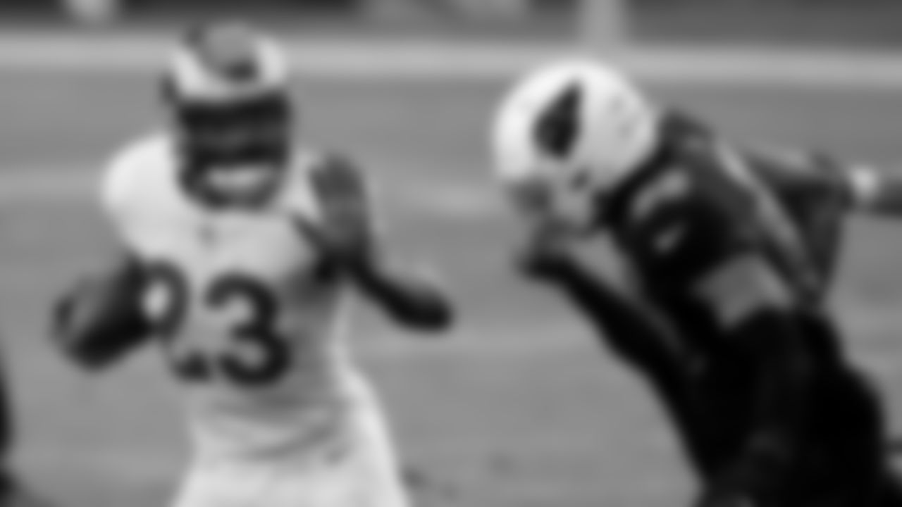 Arizona Cardinals middle linebacker Jordan Hicks (58) tries to tackle Los Angeles Rams running back Cam Akers (23) during the first half of an NFL football game, Sunday, Dec. 6, 2020, in Glendale, Ariz. (AP Photo/Ross D. Franklin)