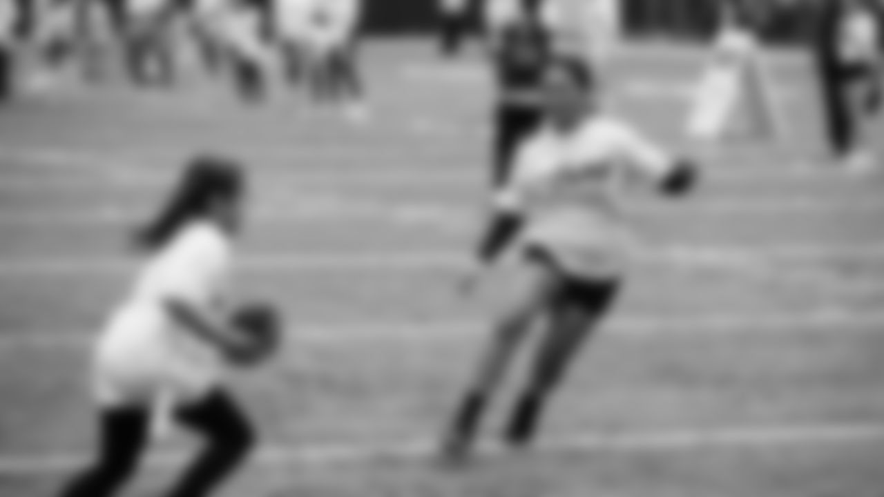 The Seahawks Women's Association packed girls flag kits and hosted a free girls flag football camp at the Seahawks training facility on Saturday, November 8, 2025.