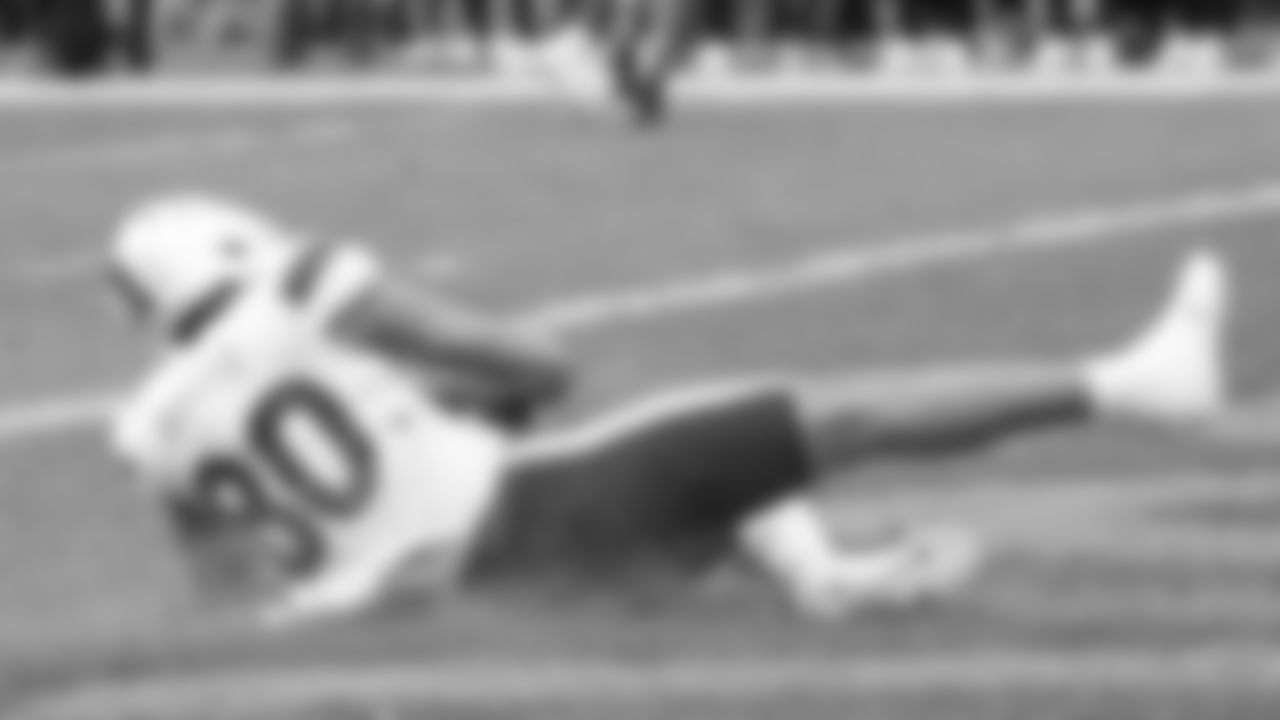 Miami tight end Elijah Arroyo (80) slides into the end zone after making a touchdown catch against Pittsburgh during the first half of an NCAA college football game, Saturday, Oct. 30, 2021, in Pittsburgh. (AP Photo/Keith Srakocic)