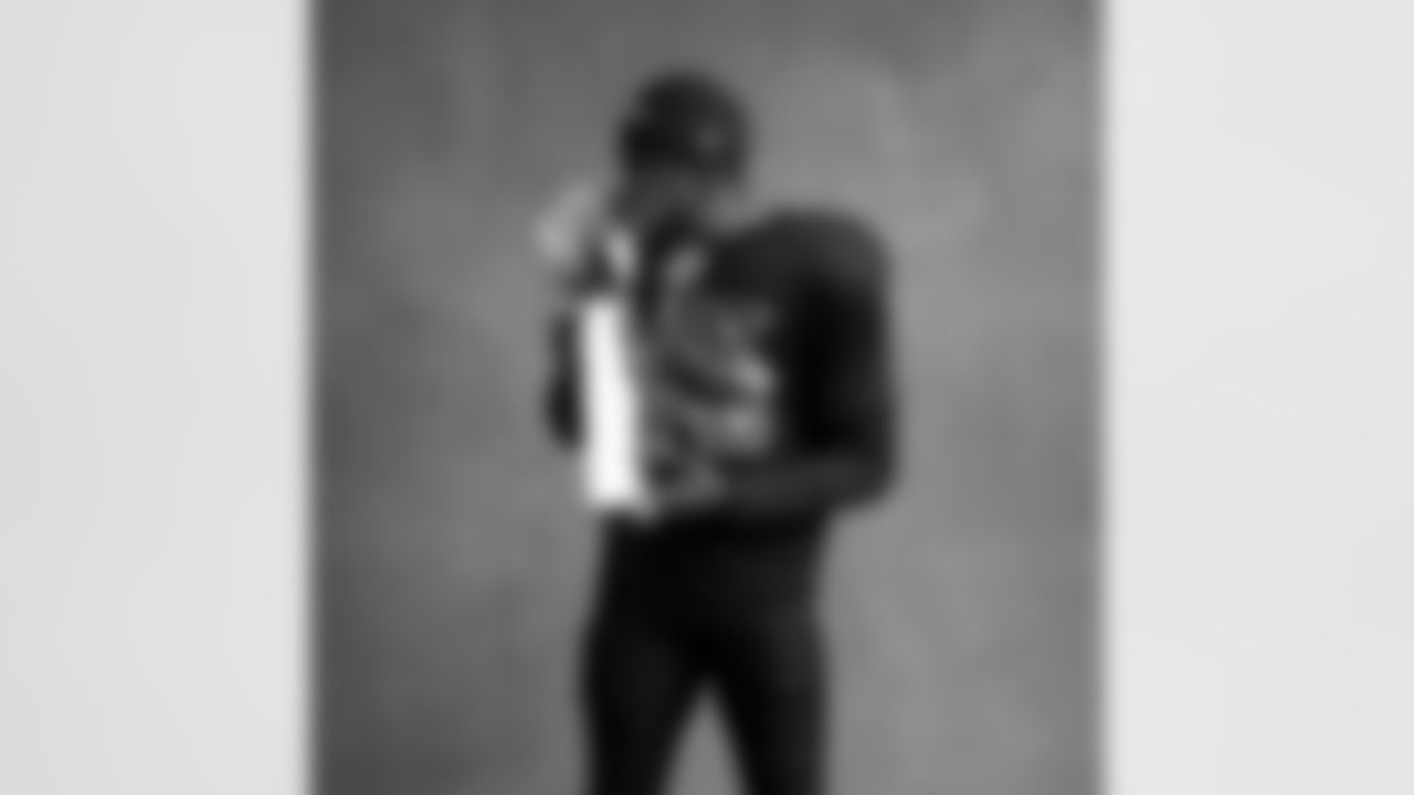 Seahawks linebacker Ernest Jones IV (13) with the Lombardi Trophy after winning Super Bowl LX.