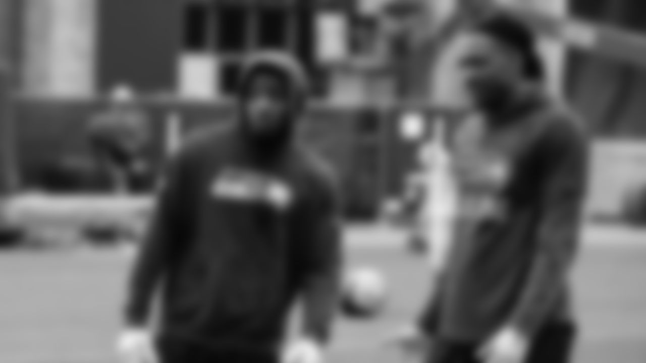 Seahawks cornerback Devon Witherspoon (21) and cornerback Riq Woolen (27) participated in a workout on May 14, 2025 at the Virginia Mason Athletic Center.