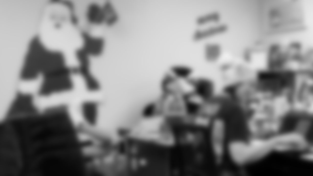 Seahawks Fullback Brady Russell, the Seahawks Dancers, and Blitz spent the day volunteering at Santa's Castle on Joint Base Lewis-McChord to celebrate the holidays and support service members and their families.