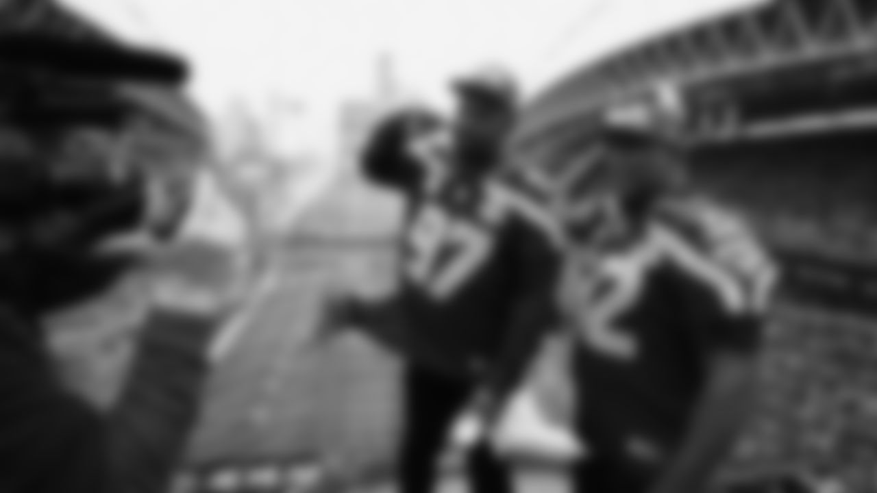 Seahawks Legends Rufus Porter and John L. Williams raise 12 flag in week 15 on December 14, 2025