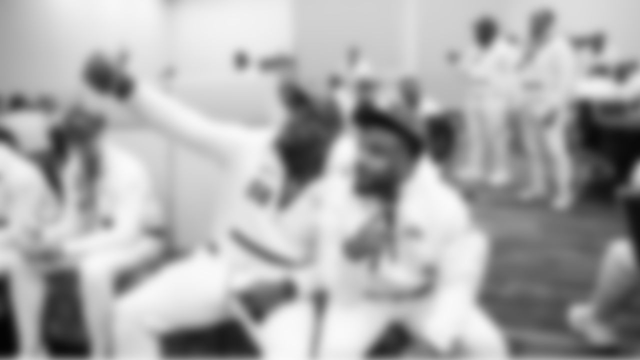 At Super Bowl Opening Night, Derick Hall and Quandre Diggs take selfies as the team prepared to meet the media.