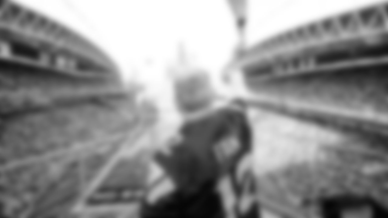 Brigadier General Richard Steve Ritchie "Cinco" of United States Air Force, raised the 12 Flag prior to kickoff of the Week 10 matchup vs. the Cardinals.