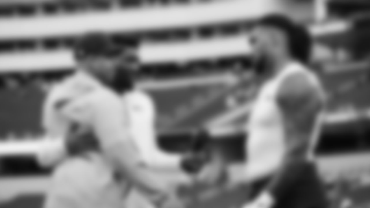 Seahawks defensive coordinator Aden Durde, defensive end DeMarcus Lawrence (0) and defensive end Leonard Williams (99) during pregame warmups at SoFi Stadium for the Week 11 matchup at the L.A. Rams.