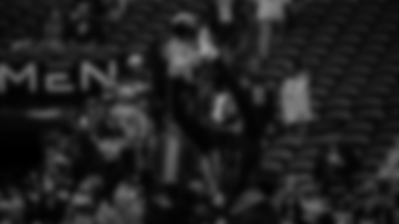 Seahawks receiver Cody White jumps high for a pass in the sunshine.