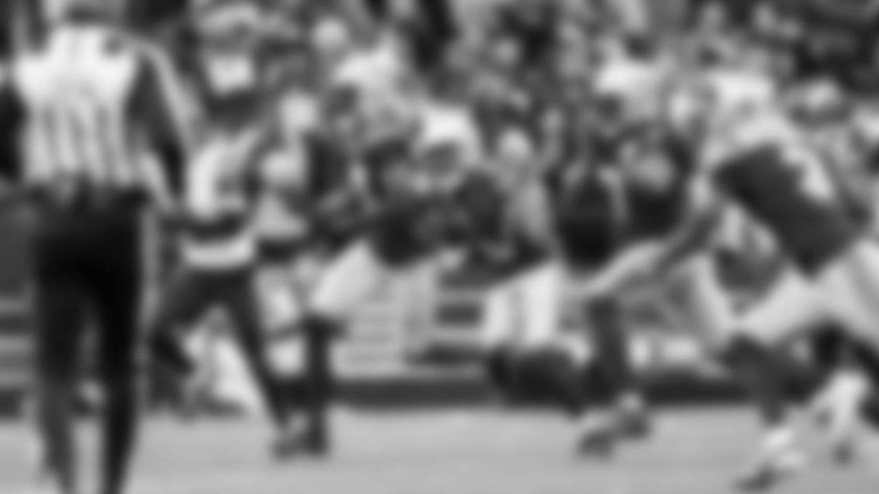 Seahawks cornerback Riq Woolen returns his interception in the fourth quarter.